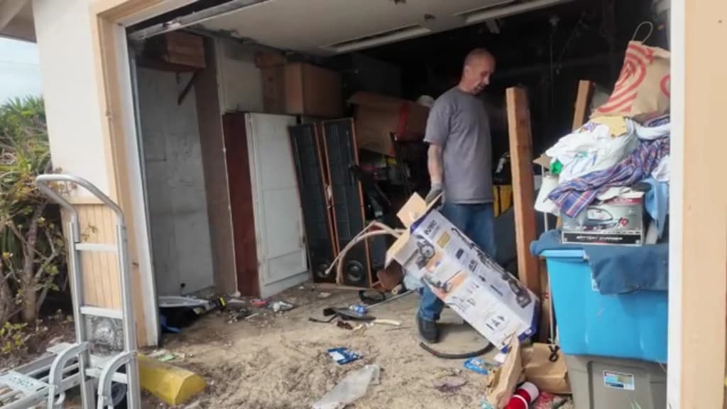 Crew completing a full garage cleanout in Hemet — furniture, appliances, and general junk removed